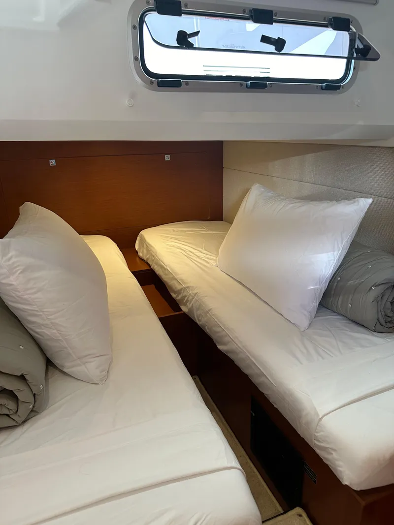 Slide: The Image of 2016 Jeanneau Leader 36 cabin with twin beds and window. - 51