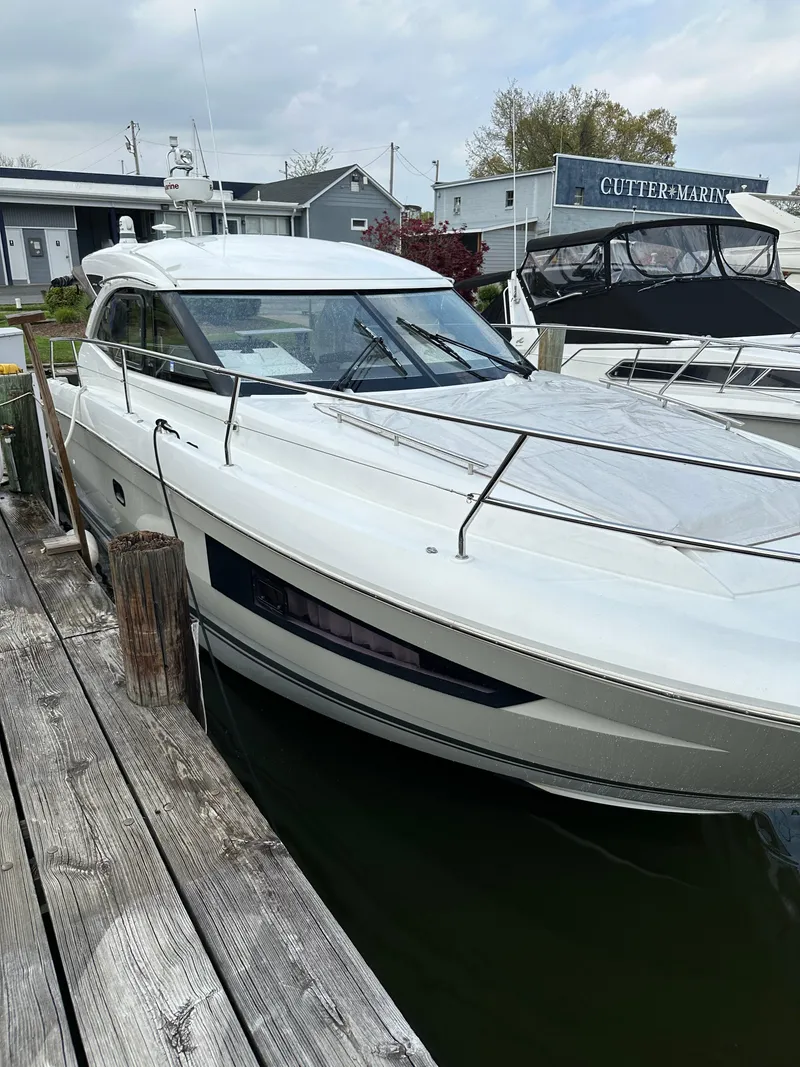 Slide: The Image of 2016 Jeanneau Leader 36 yacht docked at a marina. - 7