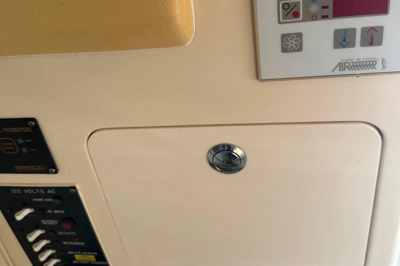 Slide: The Image of Control panel of a 2004 Grady-White Sailfish 282 WA boat. - 19