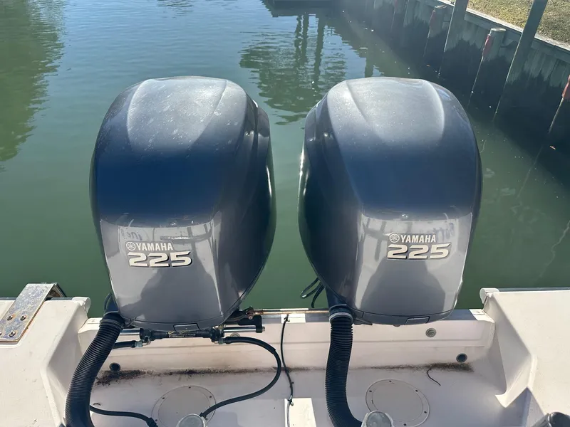 Slide: The Image of Twin Yamaha 225 outboard engines on a 2004 Grady-White Sailfish 282 WA boat. - 3