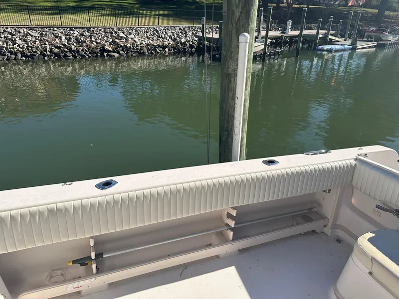 Slide: The Image of 2004 Grady-White Sailfish 282 WA boat interior with water view and dock. - 8