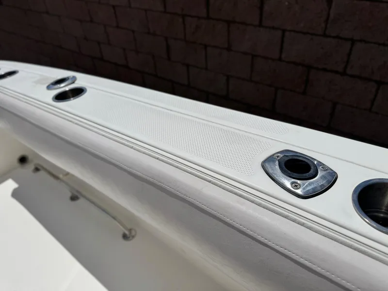 Slide: The Image of 2006 Bayliner 2503 Trophy Center Console boat detail with rod holders. - 15