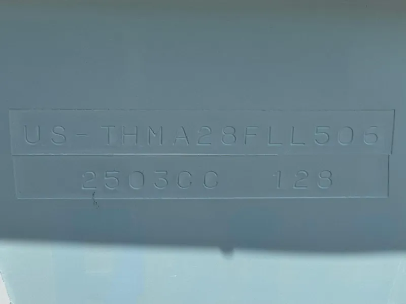 Slide: The Image of Hull identification number on 2006 Bayliner 2503 Trophy Center Console boat. - 22