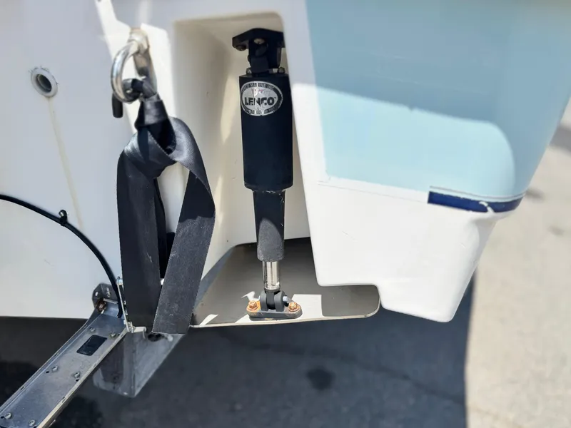 Slide: The Image of Bayliner 2503 Trophy Center Console 2006 boat trim tab and actuator detail. - 8