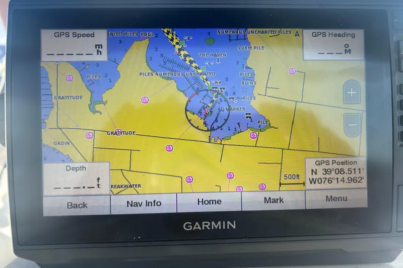 Slide: The Image of Garmin GPS display showing nautical chart with coordinates, Tartan 3500, 1998 model. - 26
