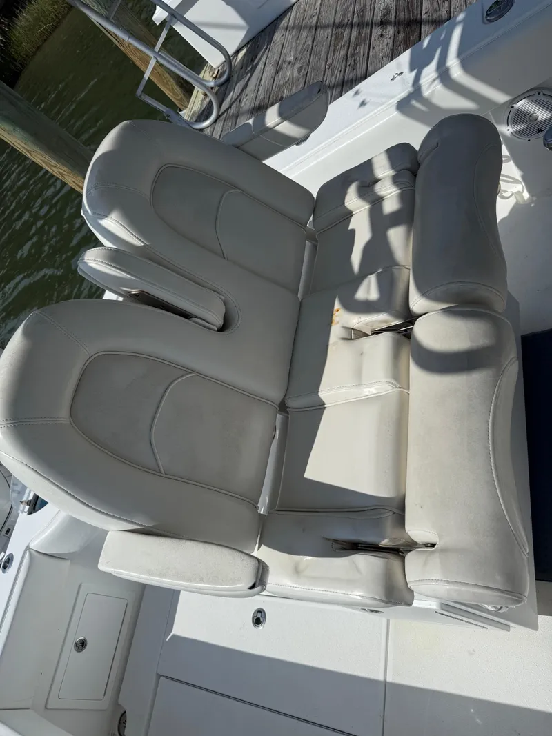 Slide: The Image of 2017 Onslow Bay 27 boat with comfortable seating and sleek design. - 6