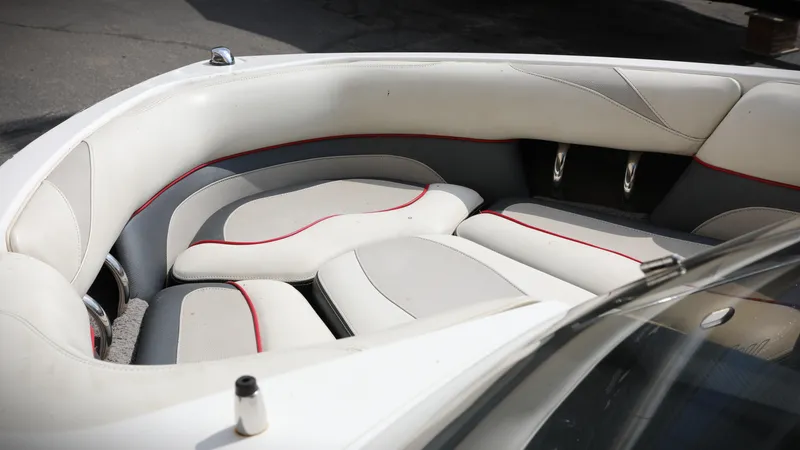 Slide: The Image of 2013 Malibu Wakesetter 20 VTX boat interior with white and red seating. - 1