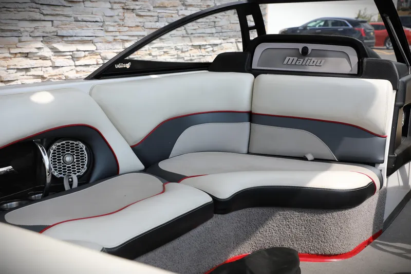 Slide: The Image of 2013 Malibu Wakesetter 20 VTX interior with stylish seating and speaker system. - 2