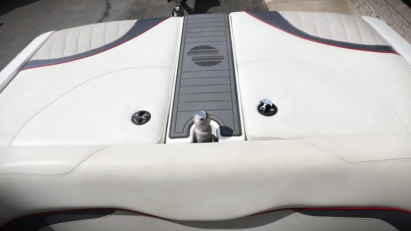 Slide: The Image of 2013 Malibu Wakesetter 20 VTX boat interior with white upholstery and sleek design. - 5