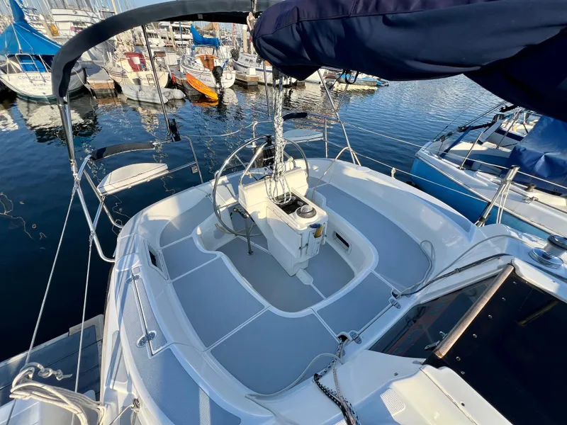 Slide: The Image of Sailboat cockpit view of 1995 Hunter 29.5, docked in a marina. - 12