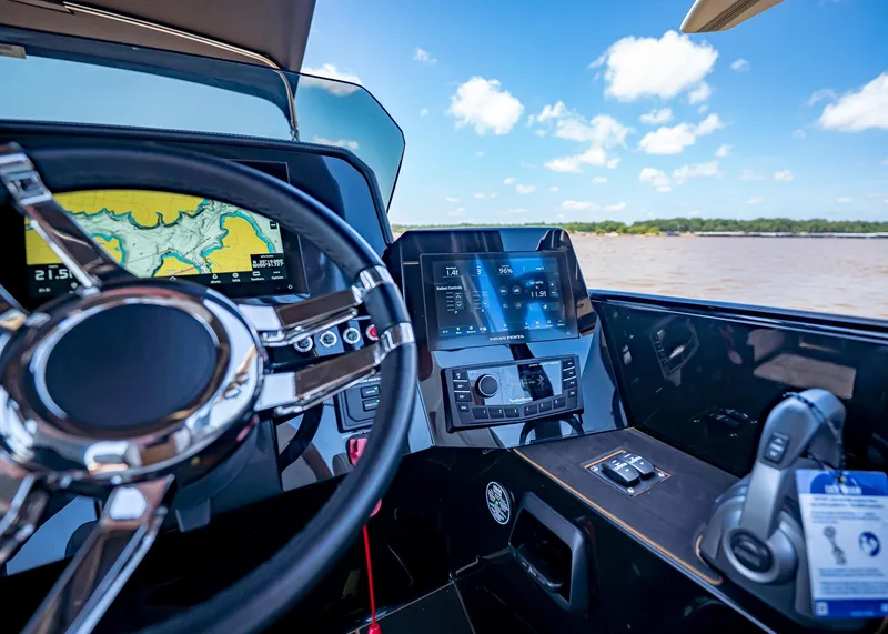 Slide: The Image of Interior of 2025 Paradigm 236 boat with advanced navigation and control systems. - 27