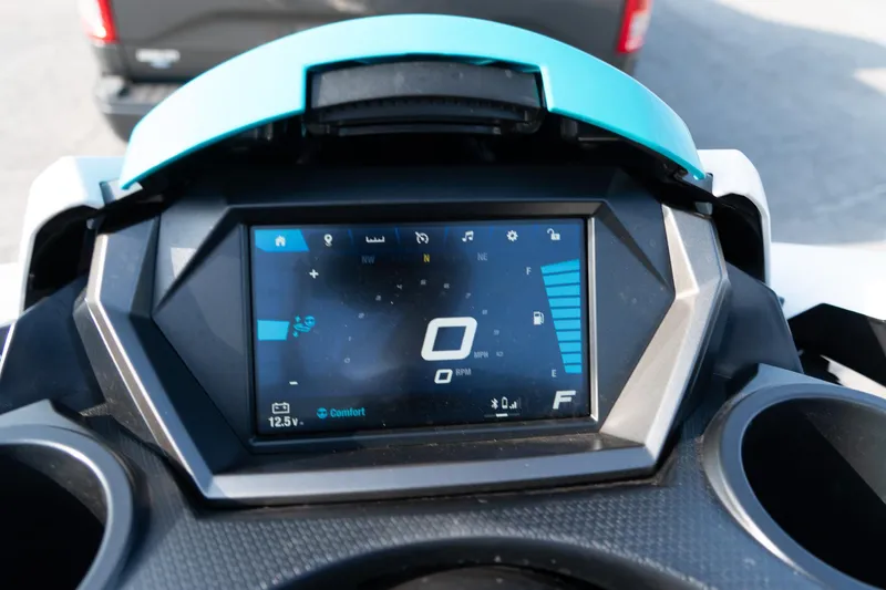 Slide: The Image of 2024 Yamaha WaveRunner FX Cruiser HO Audio dashboard with digital display and controls. - 12