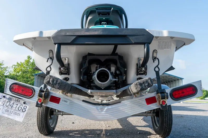 Slide: The Image of 2024 Yamaha WaveRunner FX Cruiser HO Audio on trailer, rear view, sunny day. - 6