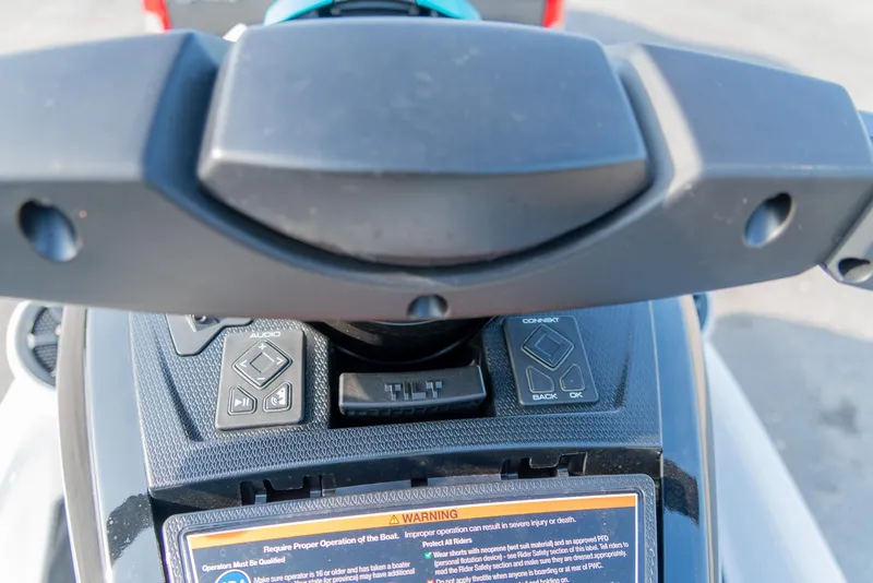 Slide: The Image of 2024 Yamaha WaveRunner FX Cruiser HO Audio dashboard with control buttons and warning label. - 9