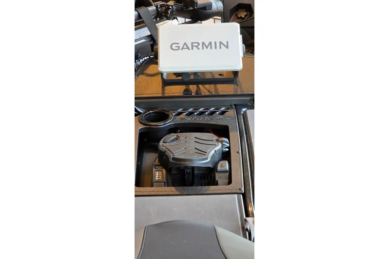 Slide: The Image of Control panel of 2025 Ranger 1880MS boat featuring Garmin navigation system. - 12