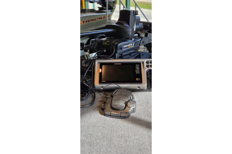 Slide: The Image of Control panel and equipment on a 2025 Ranger 1880MS boat. - 13