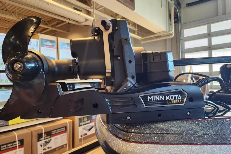 Slide: The Image of Minn Kota Ulterra motor on 2025 Ranger 1880MS boat in a showroom setting. - 5