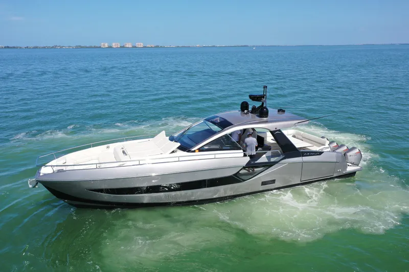 Slide: The Image of Azimut Verve 47 yacht cruising on clear blue water, 2022 model. - 0