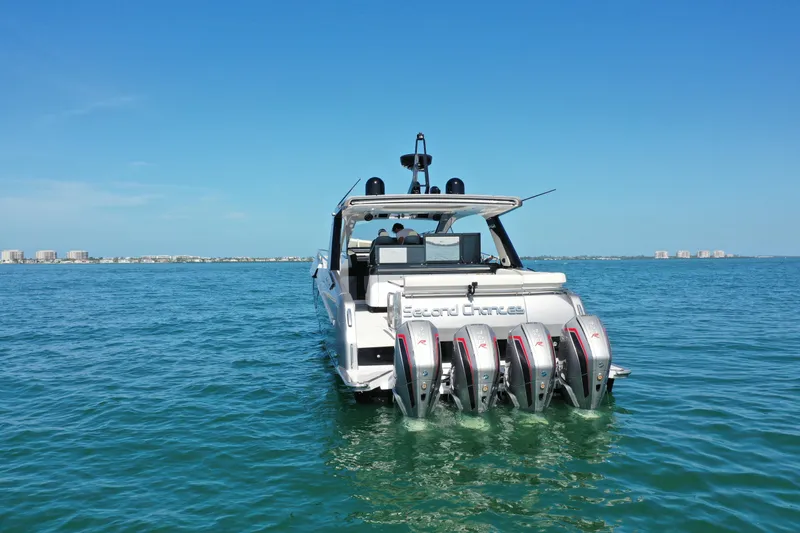 Slide: The Image of 2022 Azimut Verve 47 yacht with multiple engines on open water. - 1