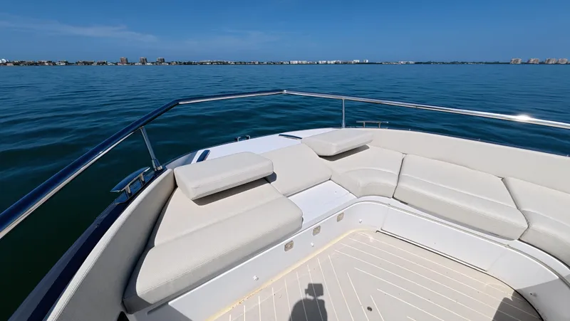 Slide: The Image of Luxurious seating on 2022 Azimut Verve 47 yacht, overlooking serene ocean view. - 13