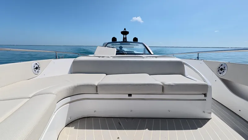 Slide: The Image of 2022 Azimut Verve 47 yacht deck with luxurious seating and ocean view. - 14