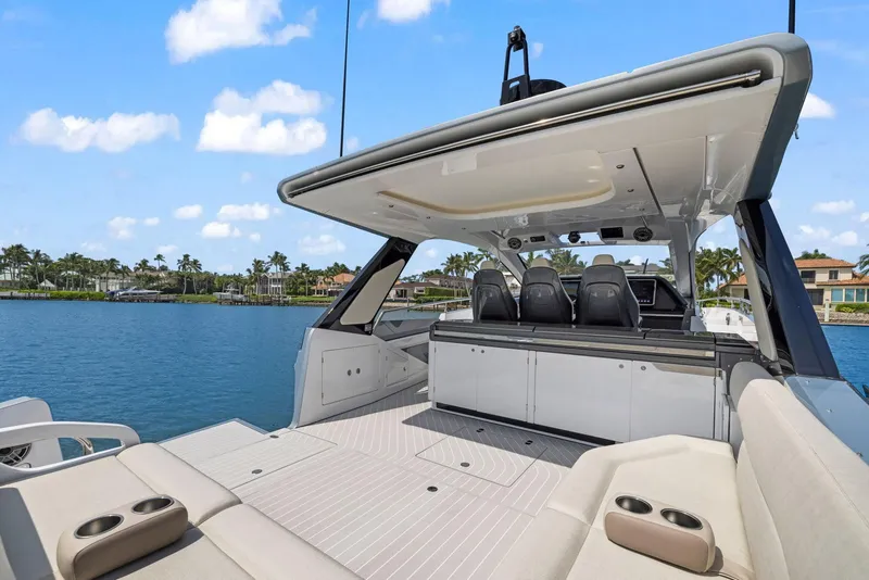 Slide: The Image of Azimut Verve 47 yacht, 2022 model, featuring luxurious seating and sleek design on open water. - 17