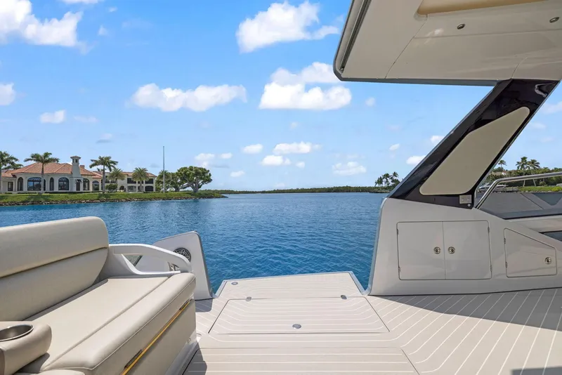 Slide: The Image of Azimut Verve 47 yacht deck with scenic waterfront view, 2022 model. - 18