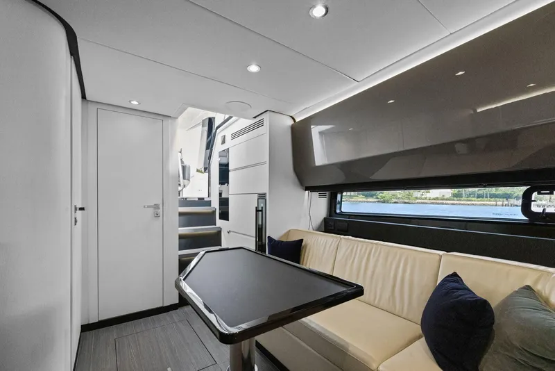 Slide: The Image of Luxurious interior of 2022 Azimut Verve 47 yacht with modern seating and sleek design. - 25