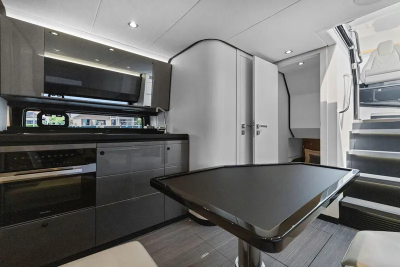 Slide: The Image of Luxurious interior of 2022 Azimut Verve 47 yacht with modern kitchen and sleek design. - 29