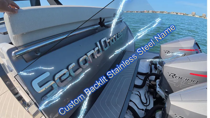 Slide: The Image of 2022 Azimut Verve 47 with custom backlit stainless steel nameplate on the water. - 33