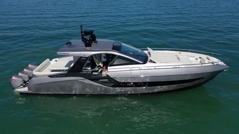 Slide: The Image of 2022 Azimut Verve 47 luxury yacht cruising on clear blue water. - 35