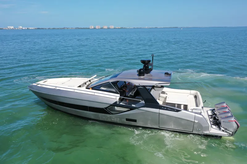 Slide: The Image of 2022 Azimut Verve 47 luxury yacht cruising on clear blue waters. - 38