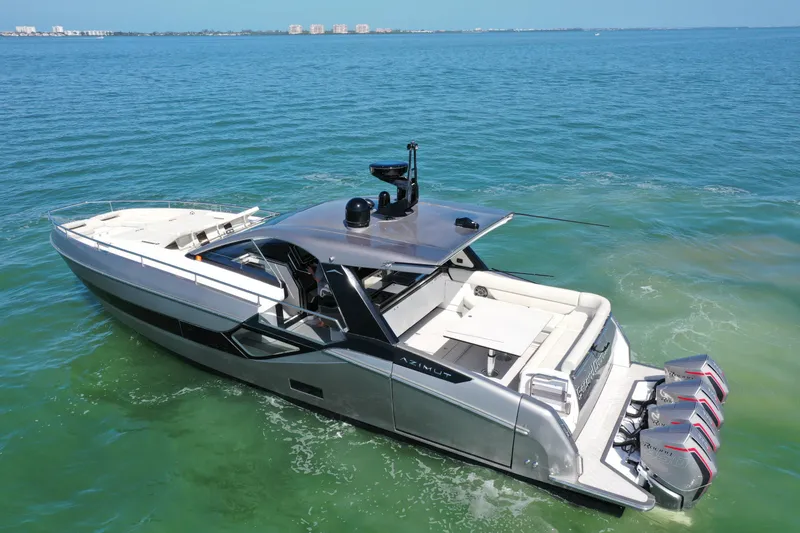 Slide: The Image of 2022 Azimut Verve 47 luxury yacht cruising on clear blue water. - 39