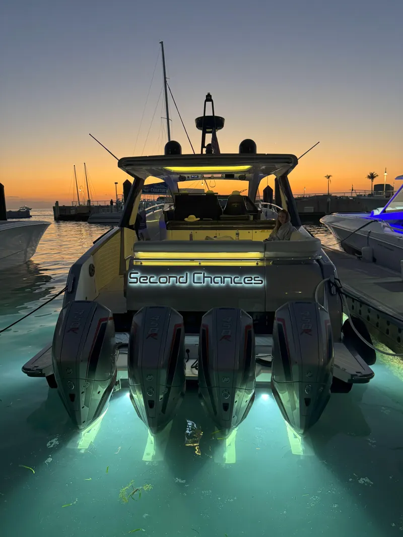 Slide: The Image of 2022 Azimut Verve 47 yacht at sunset, illuminated with underwater lights. - 5