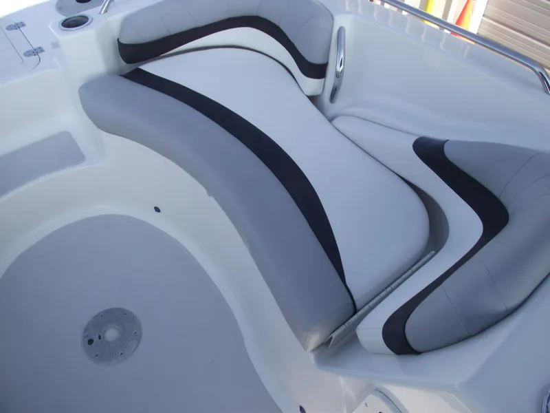 Slide: The Image of 2015 Starcraft Limited 2000 OB Fish boat interior with gray and black seating. - 12