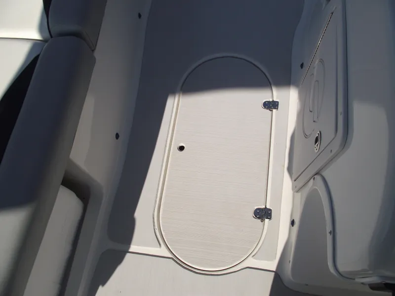 Slide: The Image of 2015 Starcraft Limited 2000 OB Fish boat interior with storage compartment. - 18