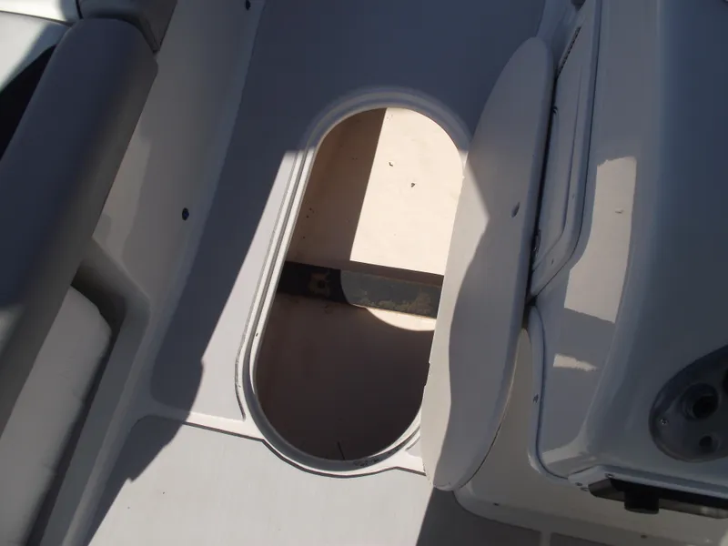 Slide: The Image of 2015 Starcraft Limited 2000 OB Fish boat storage compartment, open and empty. - 19