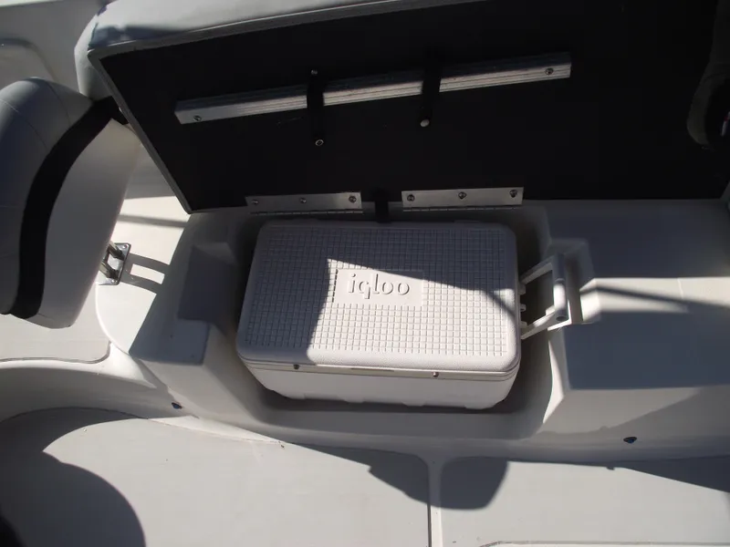 Slide: The Image of Starcraft Limited 2000 OB Fish 2015 boat with Igloo cooler storage compartment. - 21