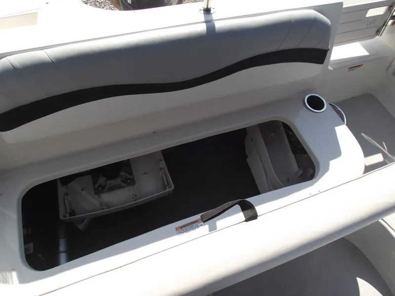 Slide: The Image of 2015 Starcraft Limited 2000 OB Fish boat interior storage compartment. - 25