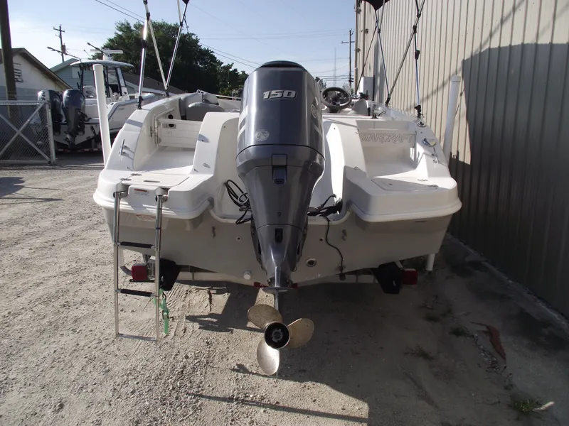Slide: The Image of 2015 Starcraft Limited 2000 OB Fish boat with 150 HP outboard motor, rear view. - 3