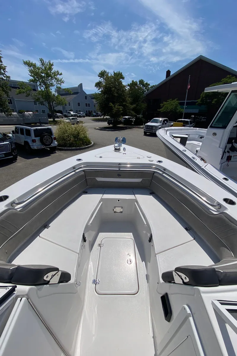 Slide: The Image of 2024 Sea Pro 240 Dual Console boat with spacious seating and sleek design. - 13