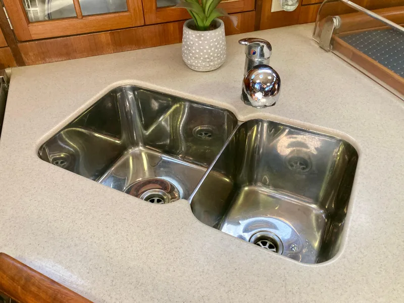 Slide: The Image of Stainless steel double sink in 2005 Hunter 41 AC yacht kitchen. - 30