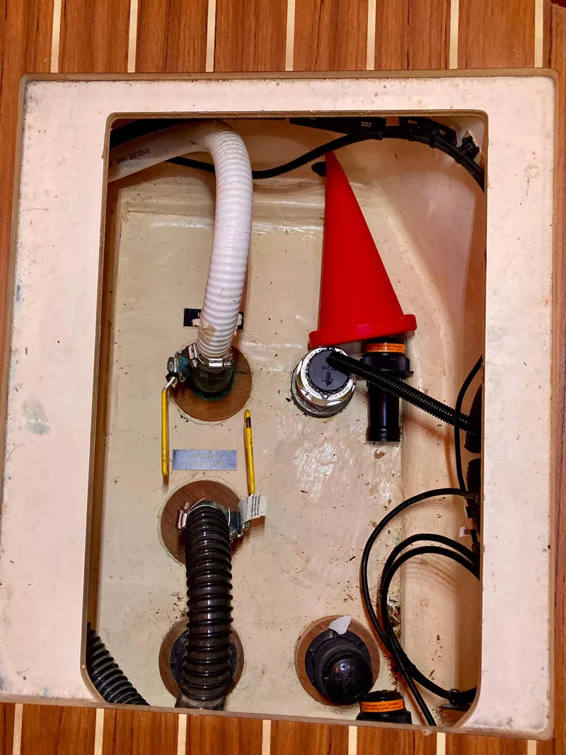 Slide: The Image of Bilge compartment of 2005 Hunter 41 AC sailboat with hoses and wiring. - 49