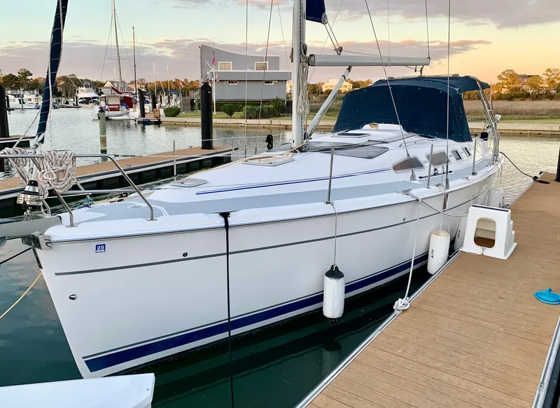 Slide: The Image of Sailboat docked at marina, Hunter 41 AC, 2005 model, sunset background. - 5