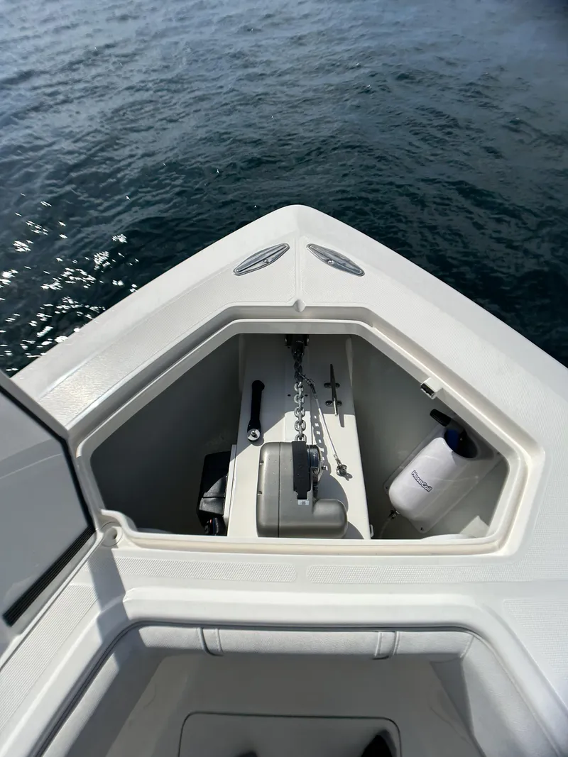 Slide: The Image of 2022 SeaVee 390z Center Console boat bow storage compartment. - 22