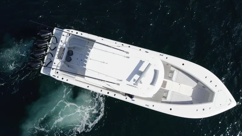 Slide: The Image of 2022 SeaVee 390z Center Console boat on open water, aerial view. - 32