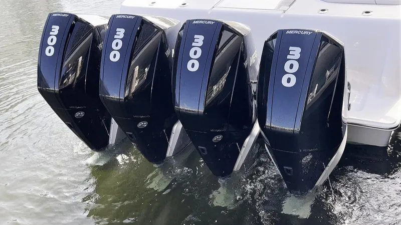 Slide: The Image of 2022 SeaVee 390z Center Console with four Mercury 300 outboard engines. - 35