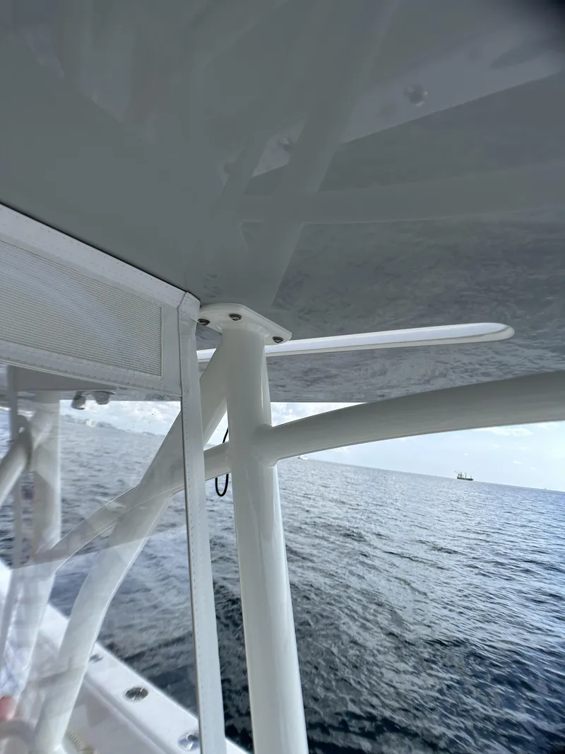 Slide: The Image of 2022 SeaVee 390z Center Console boat on open water. - 8