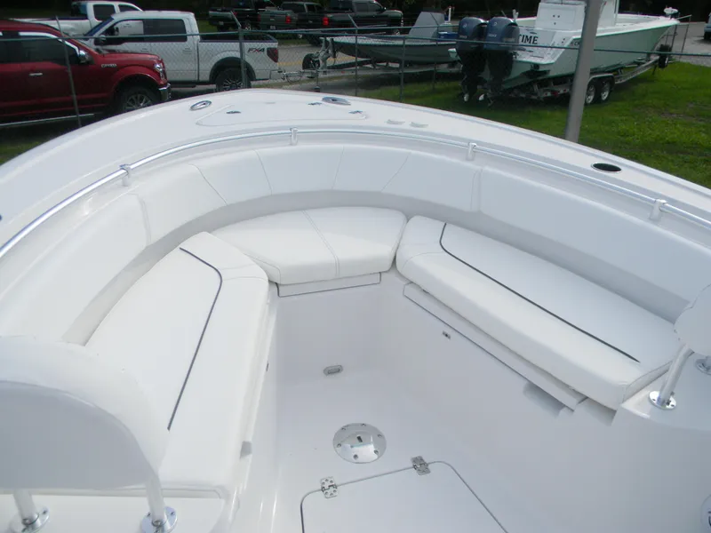 Slide: The Image of 2026 Sportsman Heritage 231 Center Console boat with spacious seating area. - 8