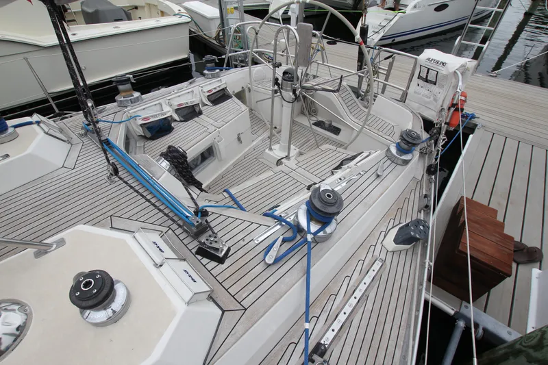 Slide: The Image of Cockpit of a 1983 Baltic 38DP sailboat with steering wheel and winches. - 11